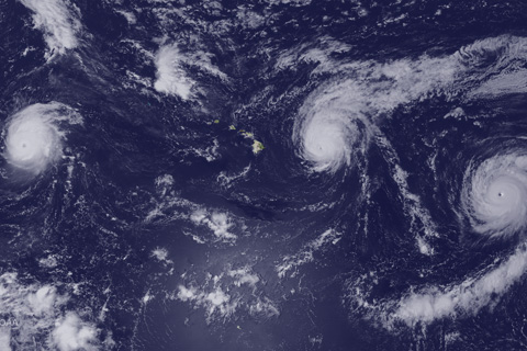 Central Pacific hurricane party: three's company