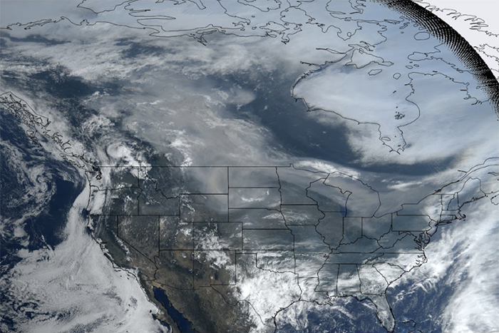 Early-season 2023 wildfires generated record-breaking surface ozone in the Upper Midwest