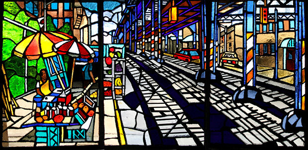 Stained glass window showing mango vendor
