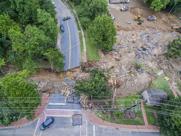 Aerial image showing a road washed out by flooding in Ellicott City, Maryland