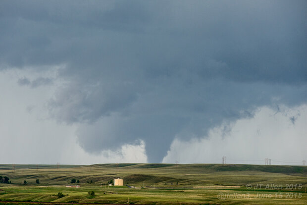 Photo of a tornado over agricultural land