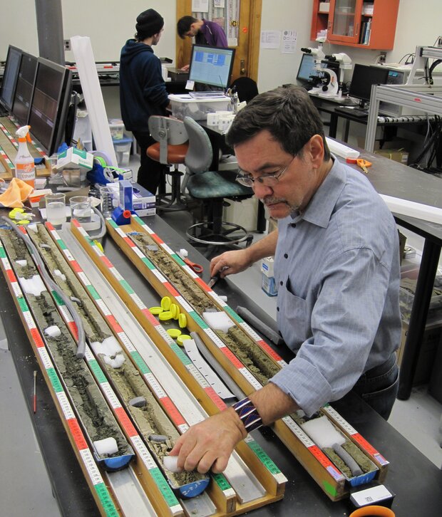Rick Potts examining a sediment core
