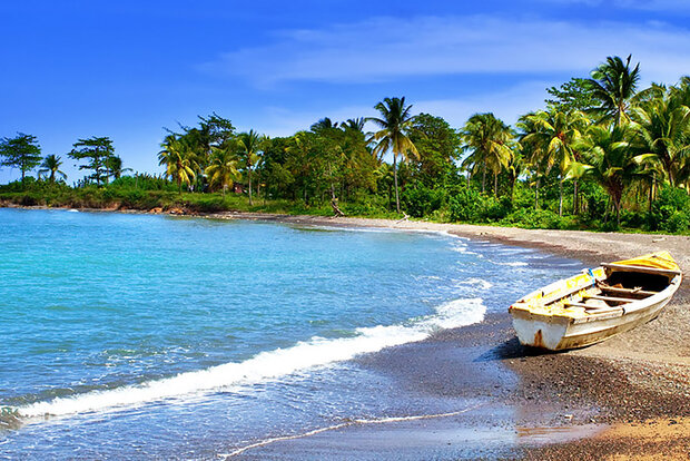 Jamaican shore with rowboat