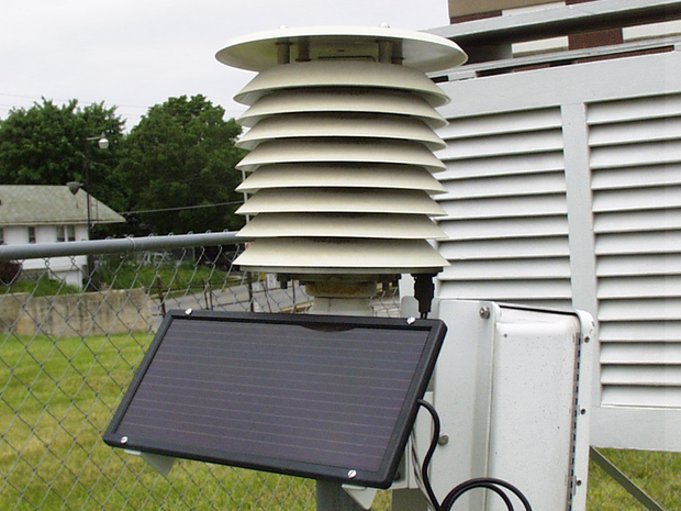 White cylinder with angled shutters