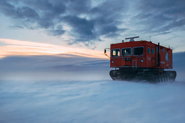 Red snowcat on Antarctic ice sheet